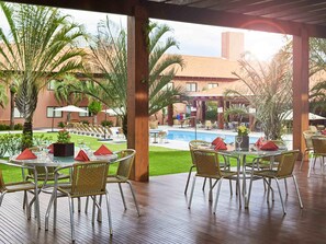 Outdoor pool, open 8:00 AM to 8:00 PM, pool loungers