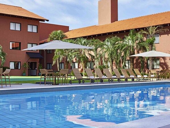 Outdoor pool, open 8:00 AM to 8:00 PM, sun loungers