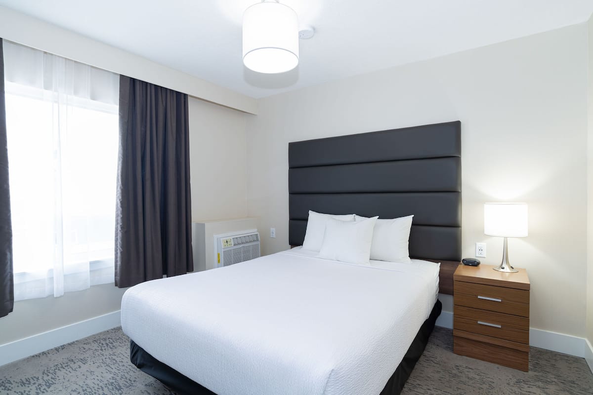 Grand Suite, 1 Queen Bed with Sofa bed, Kitchenette | 1 bedroom, desk, blackout drapes, iron/ironing board