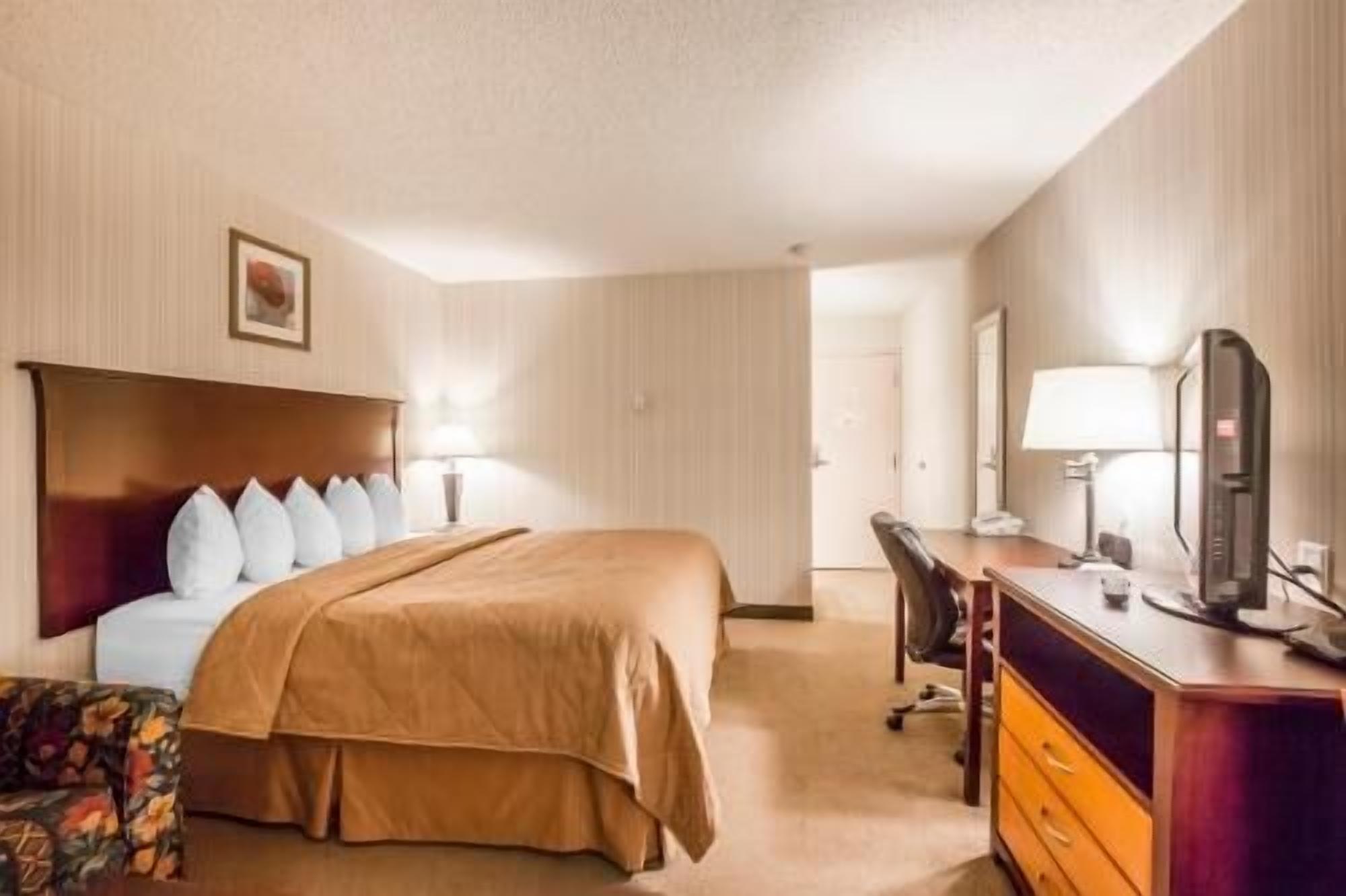 Pillowtop beds, desk, blackout drapes, iron/ironing board