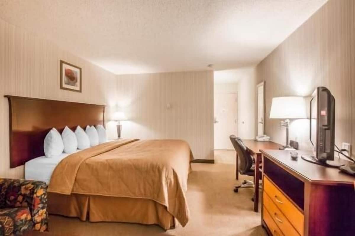 Pillowtop beds, desk, blackout drapes, iron/ironing board