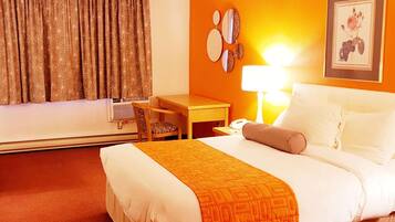 Desk, blackout drapes, iron/ironing board, free cribs/infant beds