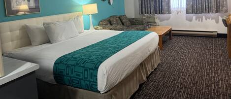 Desk, blackout drapes, iron/ironing board, free cribs/infant beds