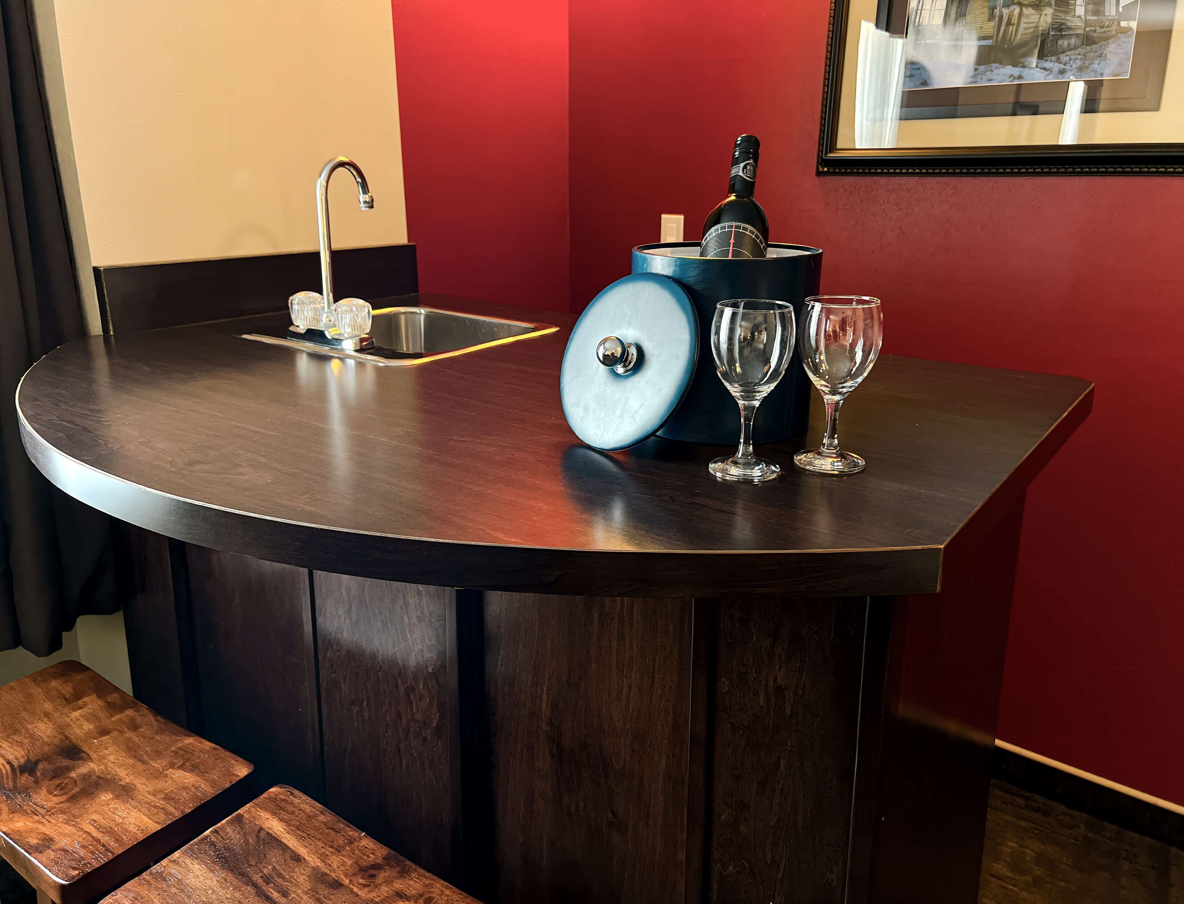 Desk, laptop workspace, blackout drapes, iron/ironing board