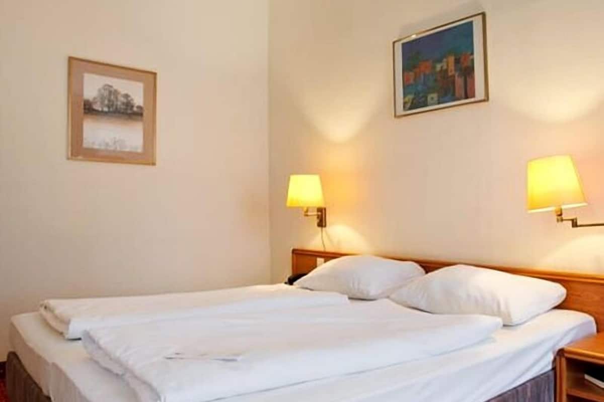 Hypo-allergenic bedding, desk, blackout drapes, soundproofing
