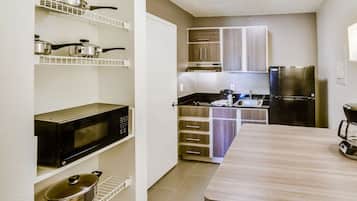 Fridge, microwave, stovetop, coffee/tea maker