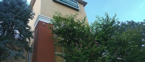 A building with a sign that reads 'HOMETOWN STUDIO.'