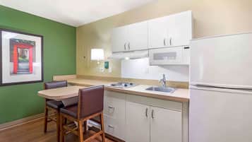 Full-sized fridge, microwave, stovetop, coffee/tea maker