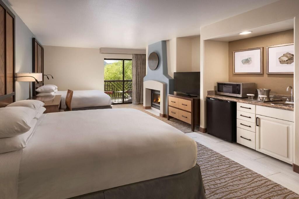 Premium bedding, down duvets, pillow-top beds, in-room safe