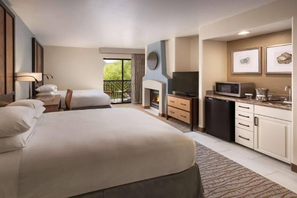 Premium bedding, down duvets, pillow-top beds, in-room safe