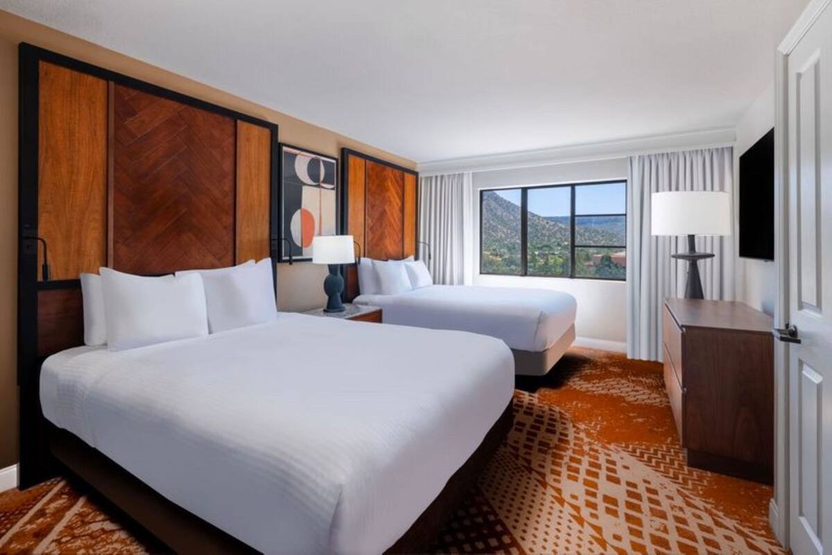 Premium bedding, down duvets, pillow-top beds, in-room safe