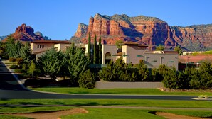 A residential area with houses, a road, and a mountain in the background. - Hilton Sedona Resort at Bell Rock (Sedona)