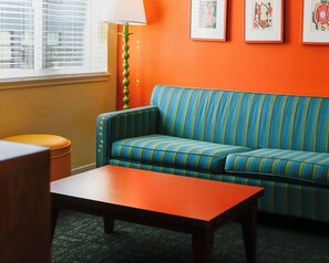 Junior Suite | Living area | 50-inch flat-screen TV with cable channels, TV, DVD player - Hotel Del Sol (San Francisco)