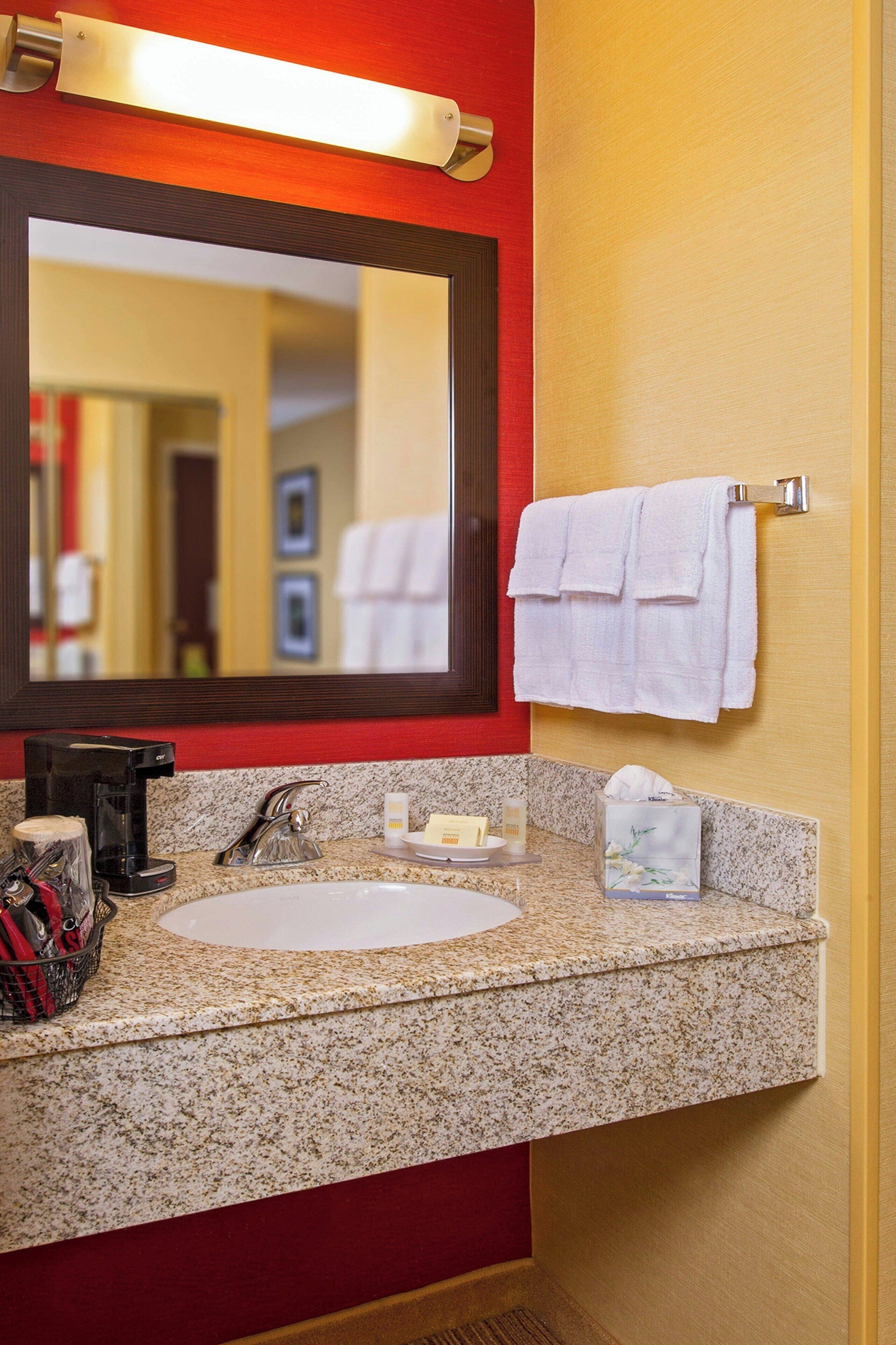 laptop workspace, blackout curtains, iron/ironing board