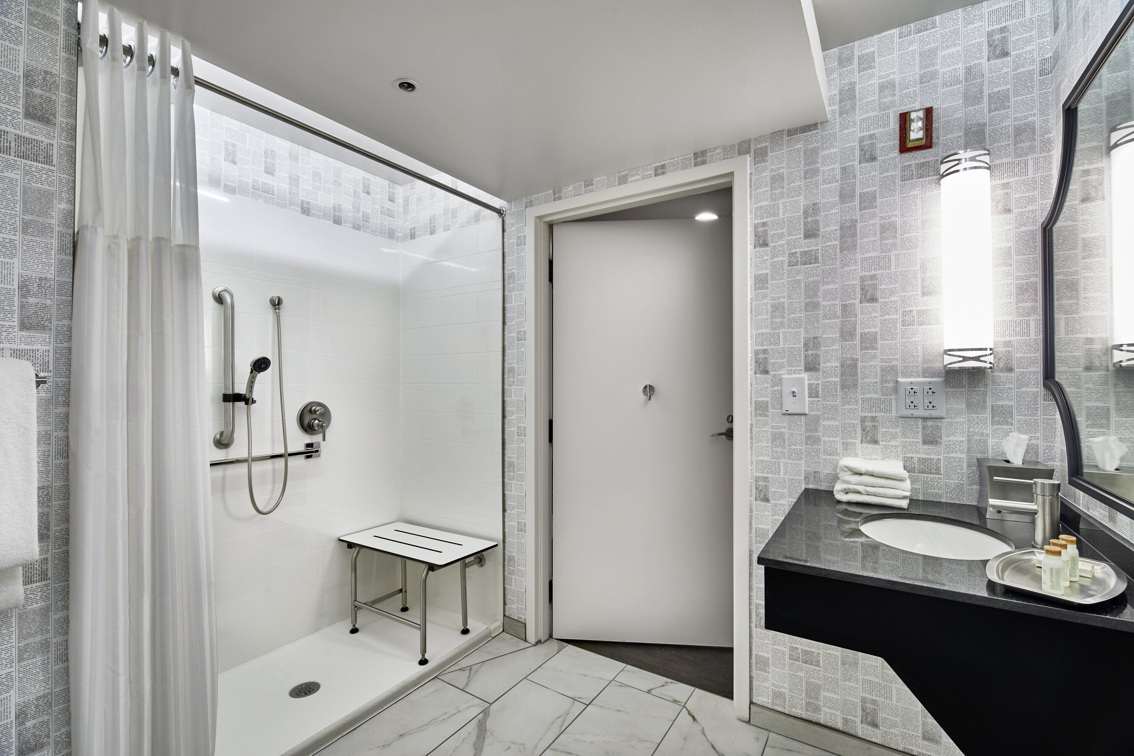 standard room, 1 king bed, accessible (roll-in shower) | bathroom | eco-friendly toiletries, hair dryer, towels, soap