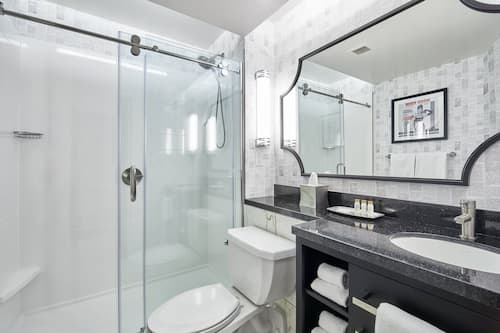 Eco-friendly toiletries, hair dryer, towels, soap
