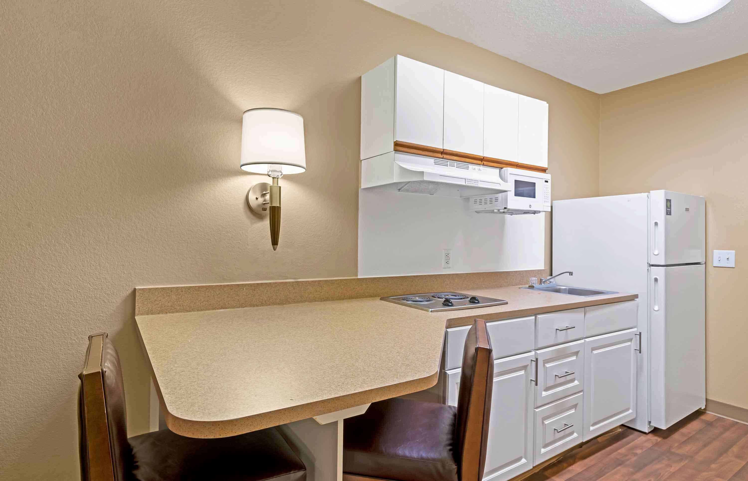 Studio, 1 Queen Bed, Non Smoking | Private kitchen | Fridge, microwave, stovetop, coffee/tea maker