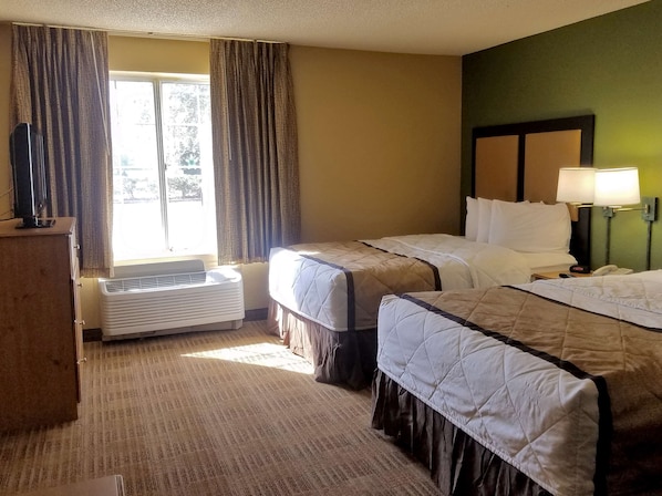 Pillow-top beds, desk, laptop workspace, blackout curtains