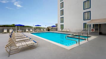 Seasonal outdoor pool, pool umbrellas