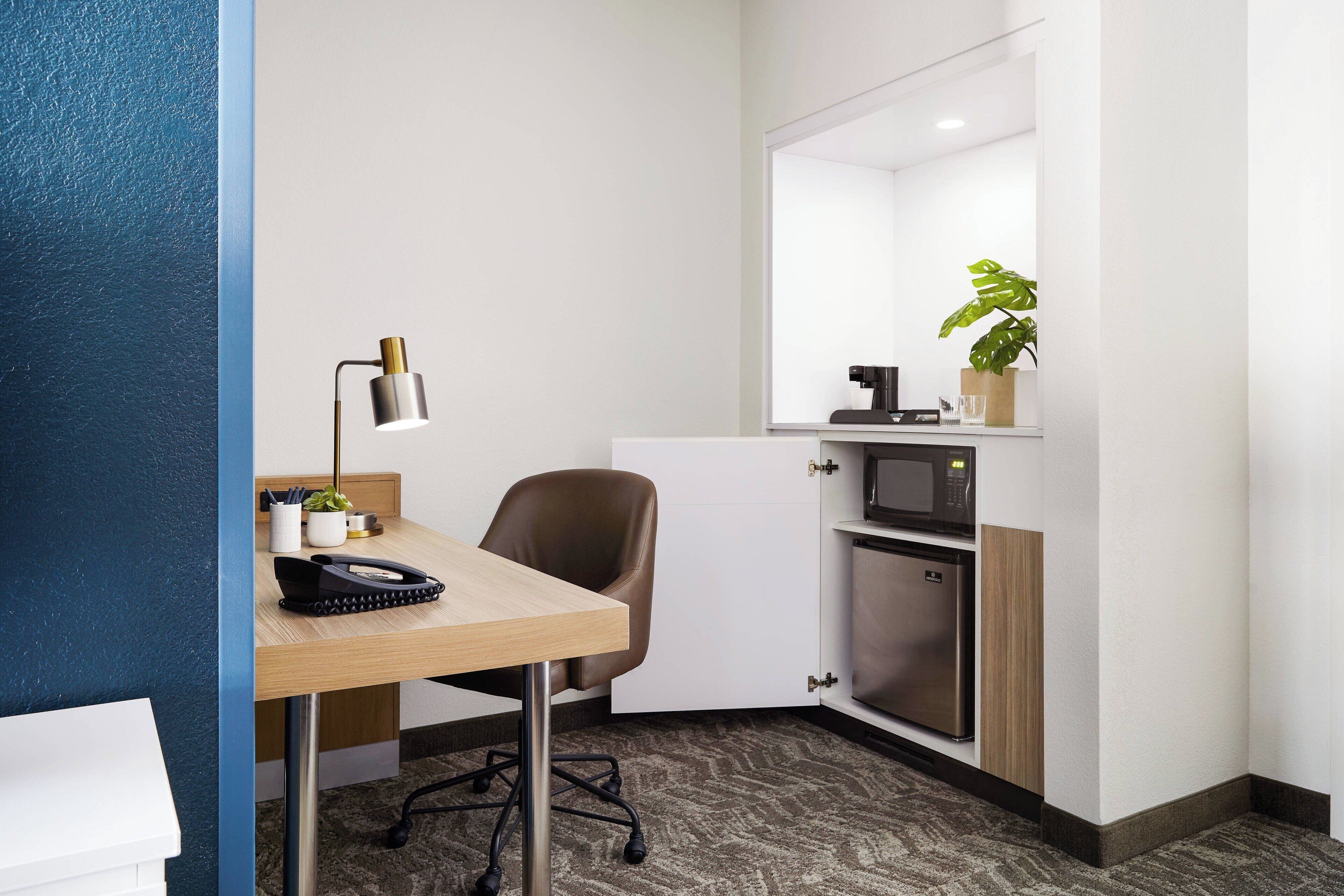 desk, blackout curtains, iron/ironing board, free cots/infant beds