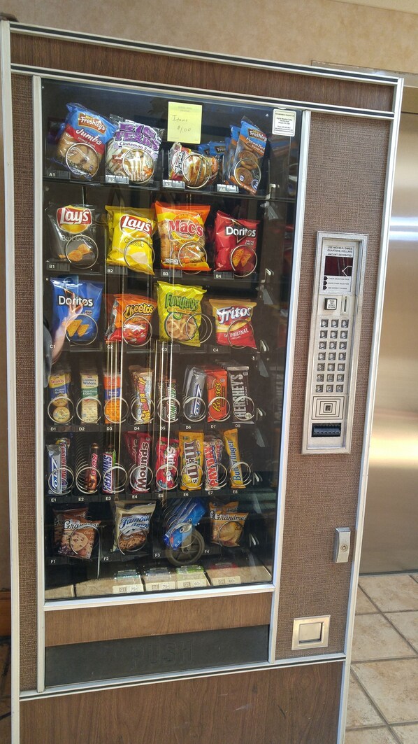 A vending machine stocked with various snacks and candies. - Econo Lodge Newport Smoky Mountains Gateway (Newport)
