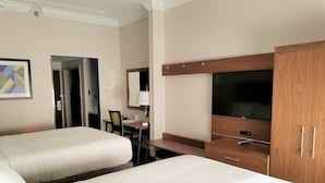 A hotel room with two beds, a desk, a TV, and a wardrobe. - Holiday Inn Express Columbia NE - Fort Jackson by IHG (Columbia)