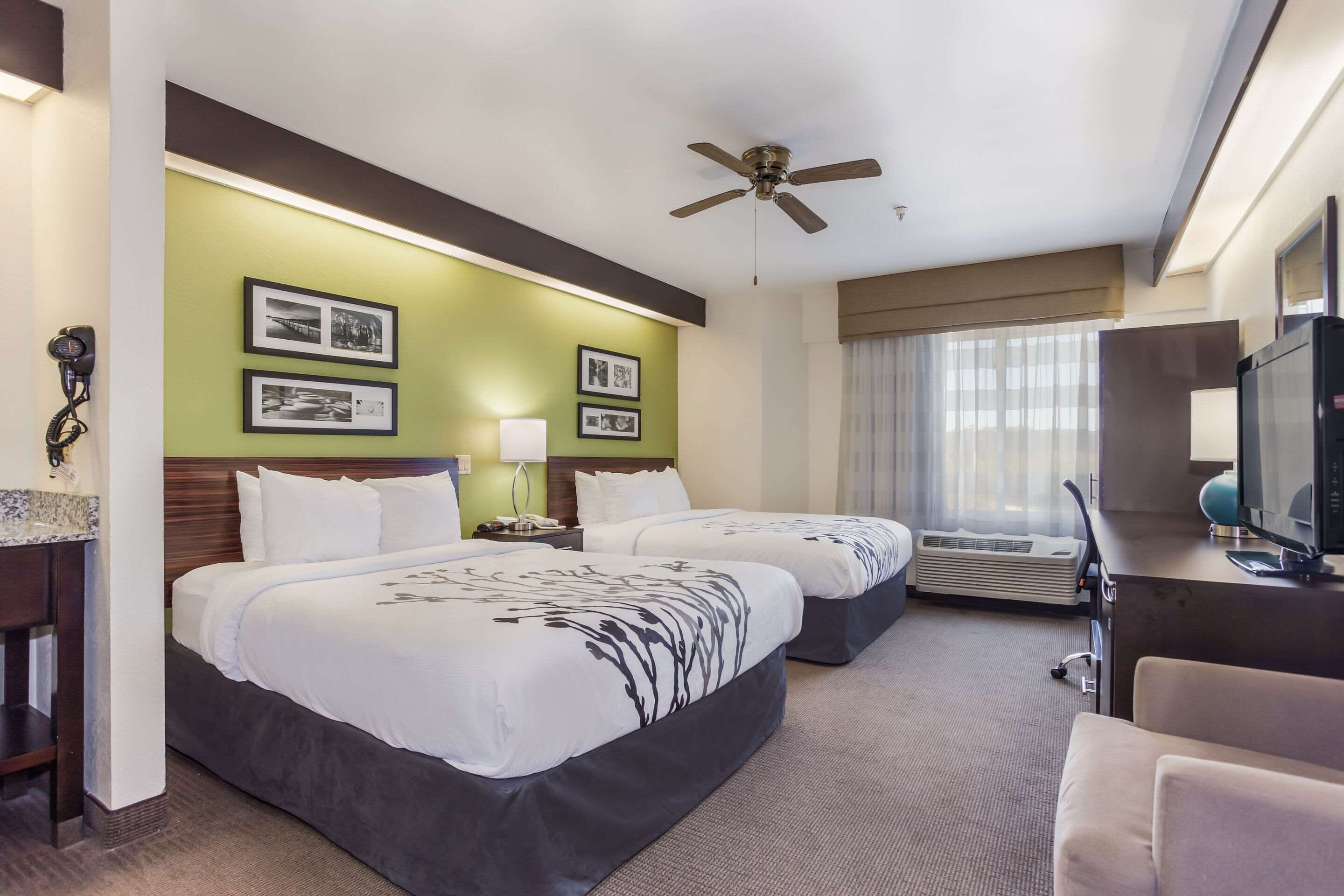 standard room, 2 queen beds, non smoking | desk, iron/ironing board, free cots/infant beds, rollaway beds