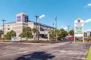 A Sleep Inn hotel with a parking lot, a 36-hole miniature golf course, and a driving range.
