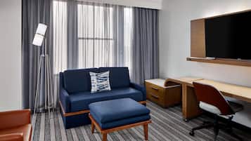 Suite, 1 King Bed with Sofa bed, Non Smoking | Living area | 27-inch TV with cable channels, pay films