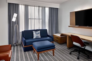 Suite, 1 King Bed with Sofa bed, Non Smoking | Living area | 27-inch TV with cable channels, pay films