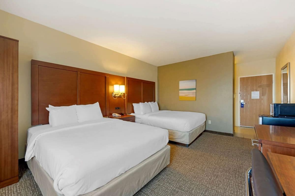 Desk, laptop workspace, blackout curtains, iron/ironing board