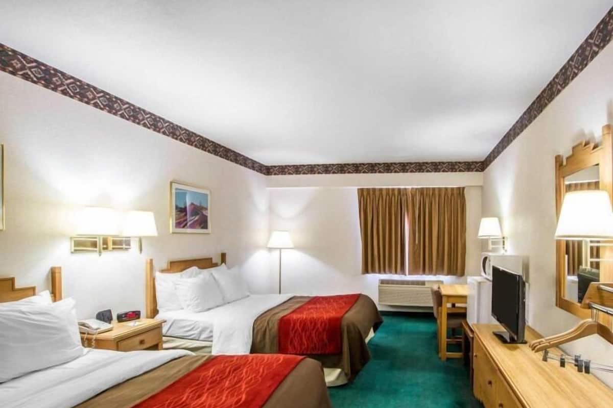 Desk, laptop workspace, blackout curtains, iron/ironing board