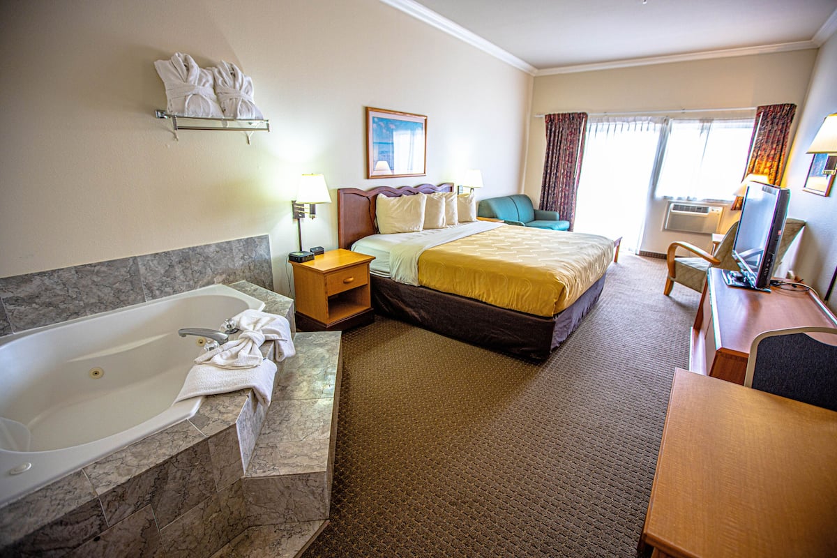Superior King Suite | Premium bedding, desk, laptop workspace, iron/ironing board