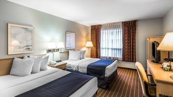 Premium bedding, desk, laptop workspace, iron/ironing board