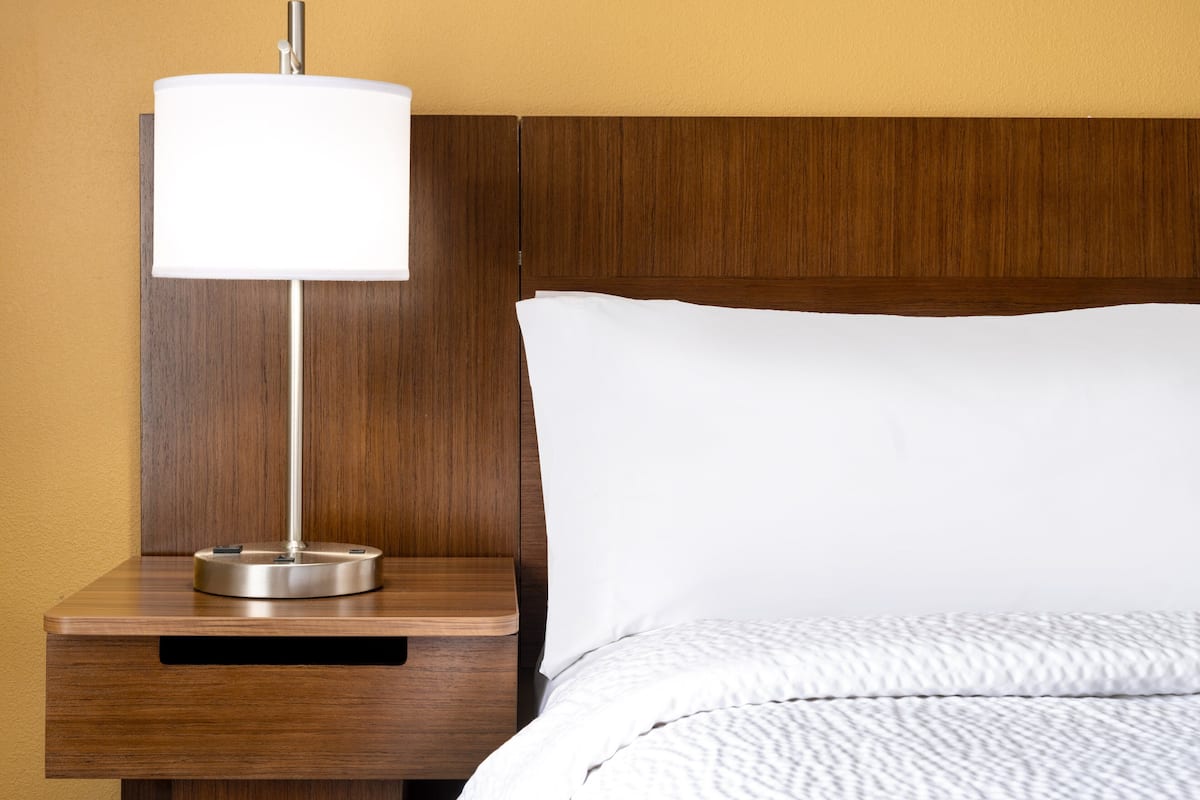 Down comforters, desk, laptop workspace, blackout drapes