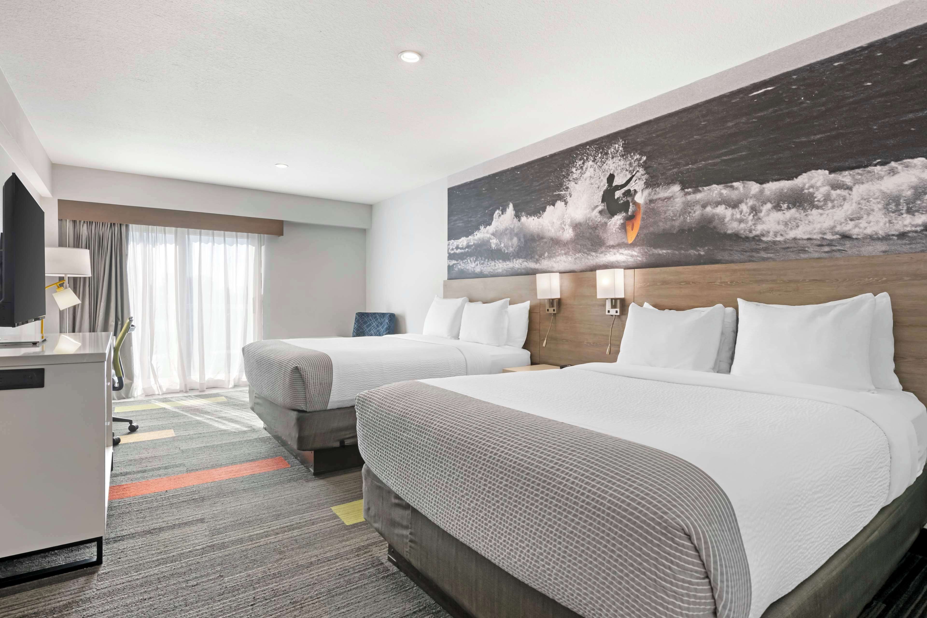 standard room, 2 queen beds, non smoking, refrigerator & microwave | premium bedding, pillow-top beds, in-room safe, desk