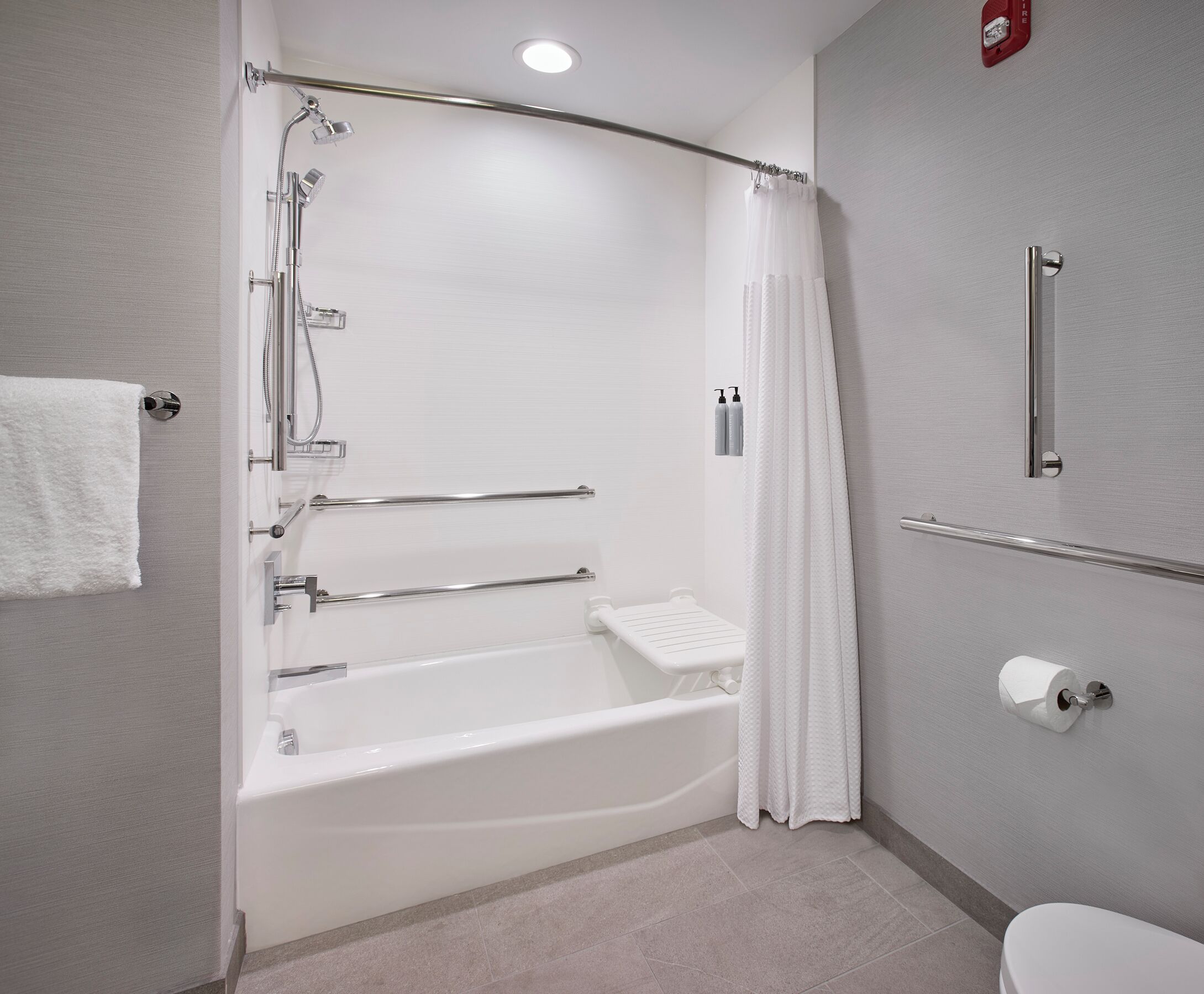 combined shower/bathtub, free toiletries, hair dryer, towels