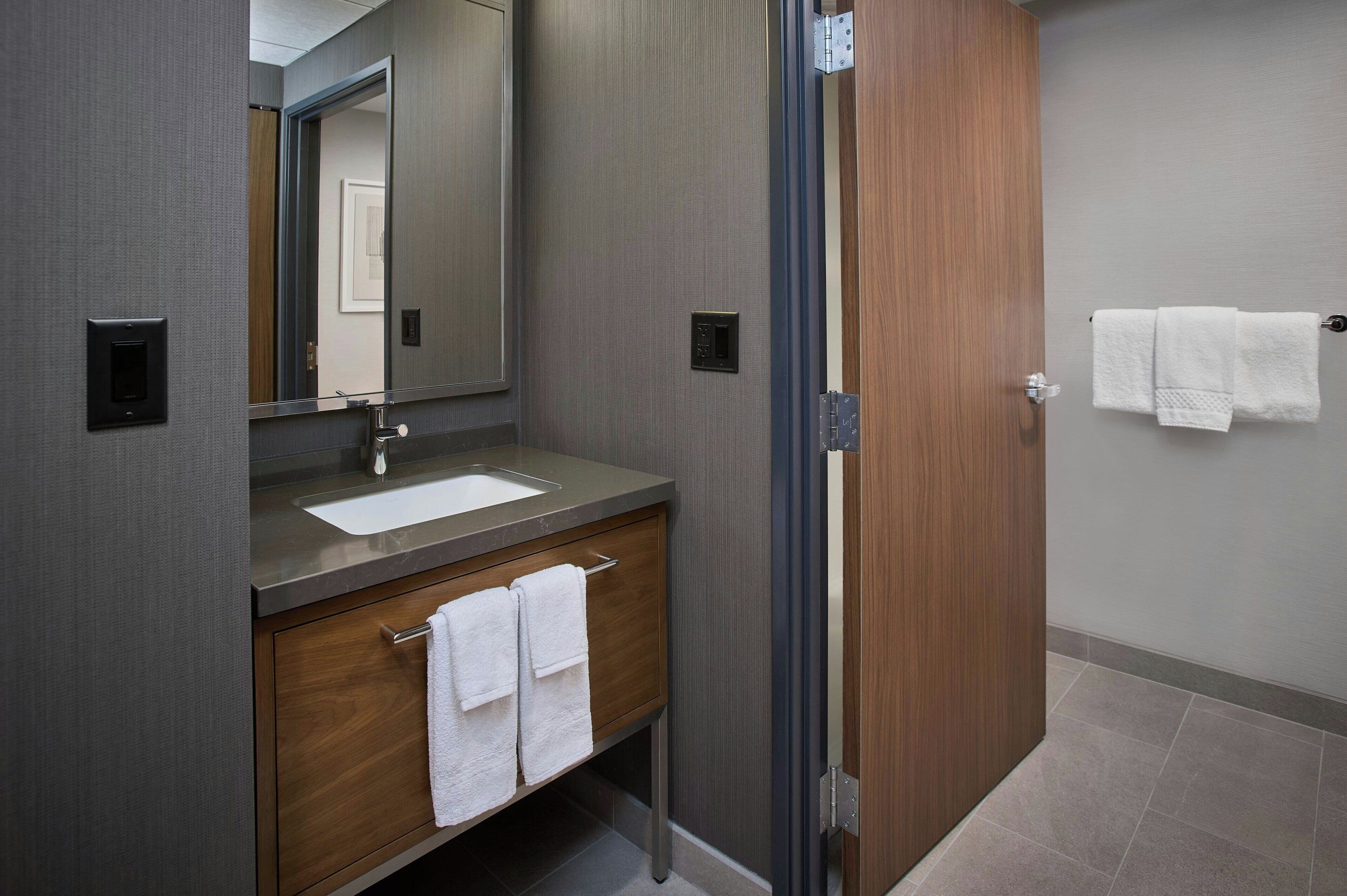 combined shower/bathtub, free toiletries, hair dryer, towels