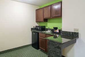Suite, 1 King Bed, Non Smoking | Private kitchen | Fridge, microwave, coffee/tea maker