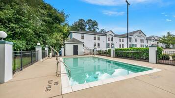 Seasonal outdoor pool, open 9:00 AM to 9:00 PM, sun loungers