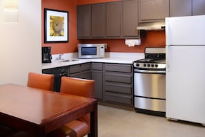 Full-size fridge, microwave, stovetop, coffee/tea maker