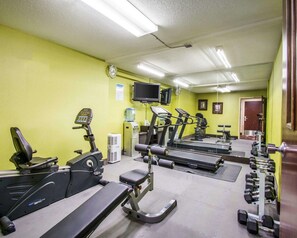 Stay fit on the go with our fully equipped gym featuring a treadmill, elliptical trainer, stationary bike, bench press, and dumbbells.