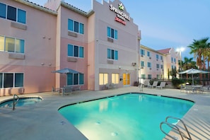 Outdoor pool, open 8:00 AM to 10:00 PM, pool umbrellas, pool loungers
