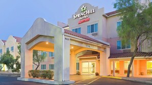A hotel entrance with a sign reading "Springhill Suites Marriott" and a number "9425" above the door. - SpringHill Suites Phoenix North (Phoenix)