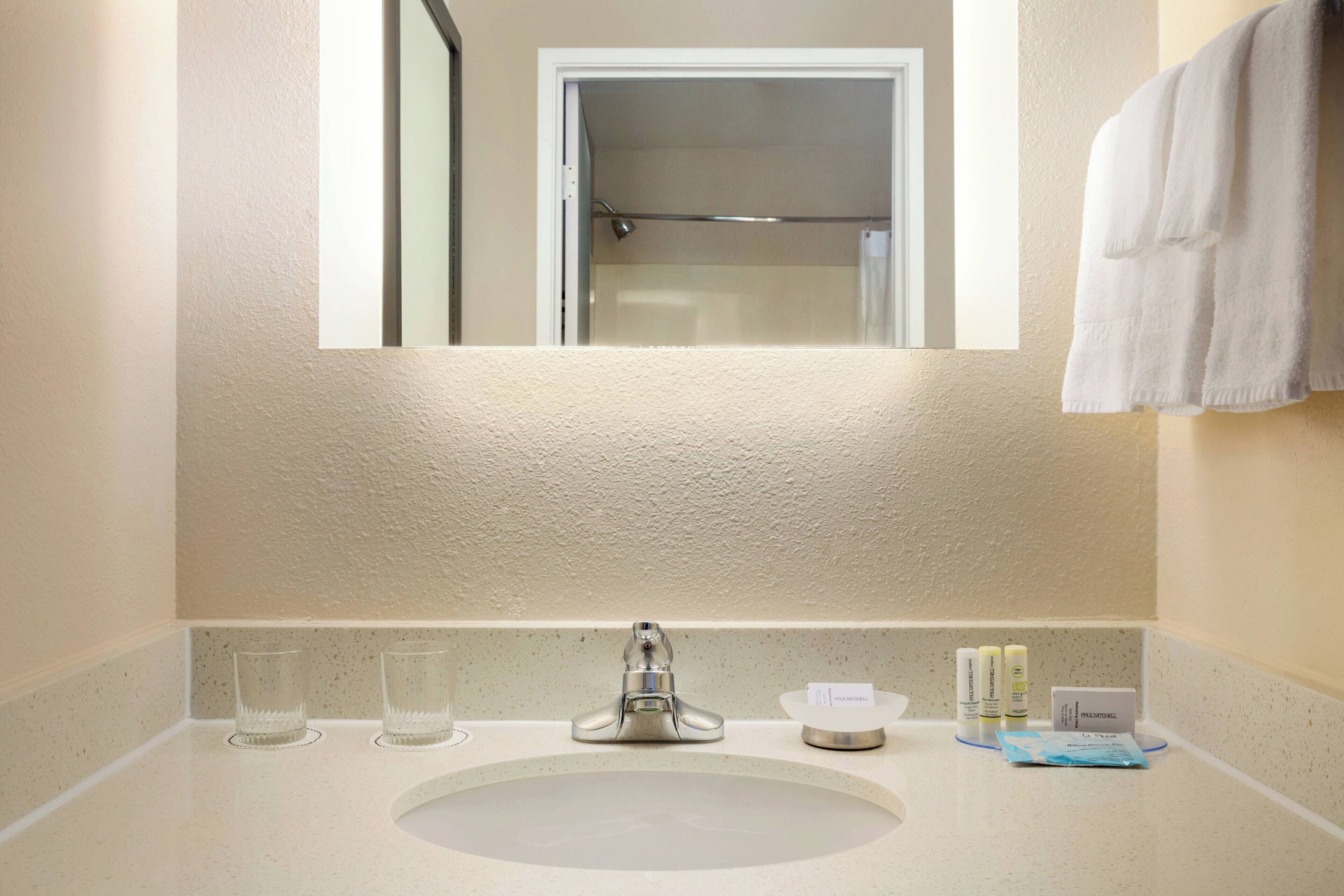 combined shower/bathtub, free toiletries, hair dryer, towels