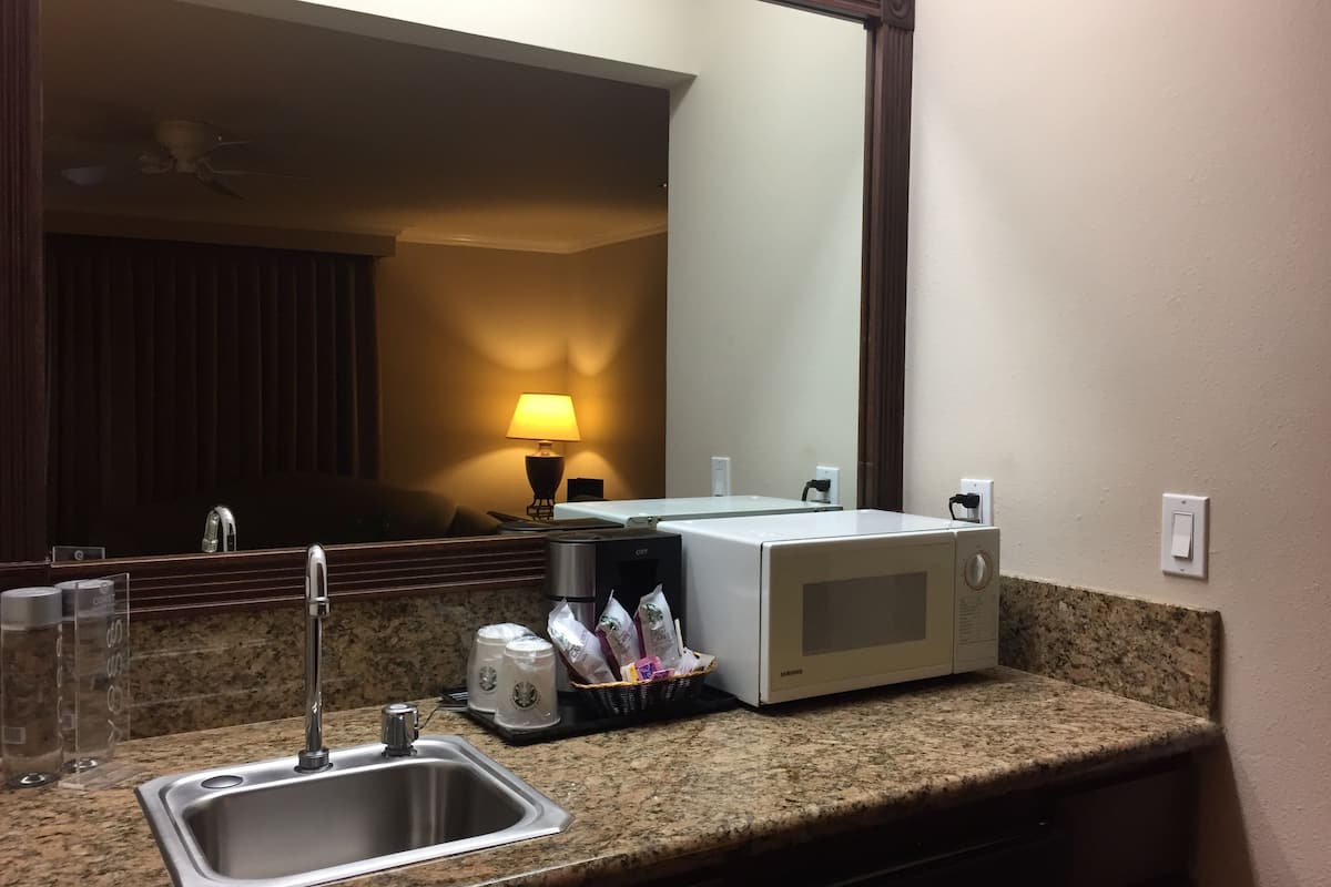 premium suite, 1 king bed (coast premium king junior suite) | private kitchenette | coffee/tea maker