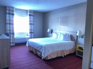 Quarto standard, 1 cama King, acessível | Cortinas blackout, berços (sobretaxa)