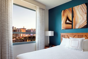 Premium bedding, down comforters, desk, laptop workspace