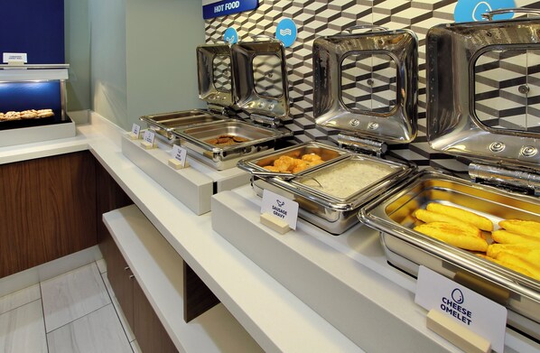 Enjoy a diverse selection of hot and cold dishes at our buffet.