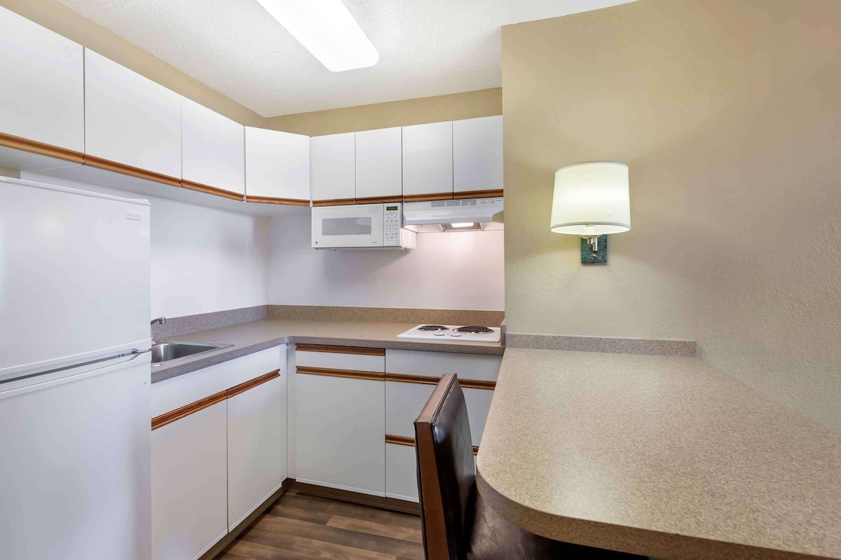 deluxe studio, 1 king bed with sofa bed, non smoking | pillow-top beds, desk, blackout curtains, iron/ironing board